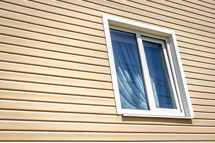 siding of house with window