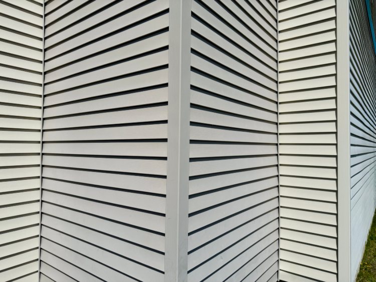 Close-up of a house featuring newly installed composite siding in Salem, NH