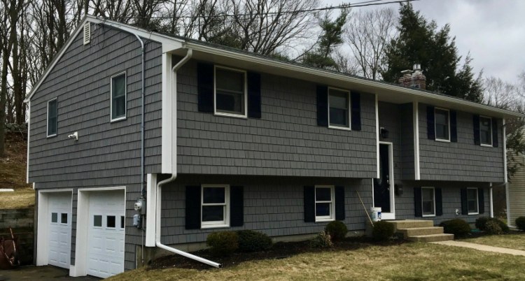 Shake and shingle siding installed on the home by Brooks Siding Windows & Doors in Salem, NH